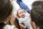 Mother father and baby, Visual concept for an estate planning blog discussing Michigan Estate Planning for New Parents.